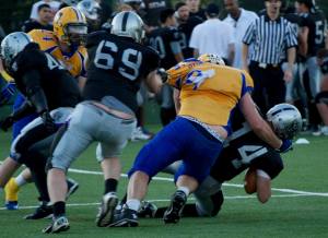 Big Mick Rigney making friends with the Pirates QB